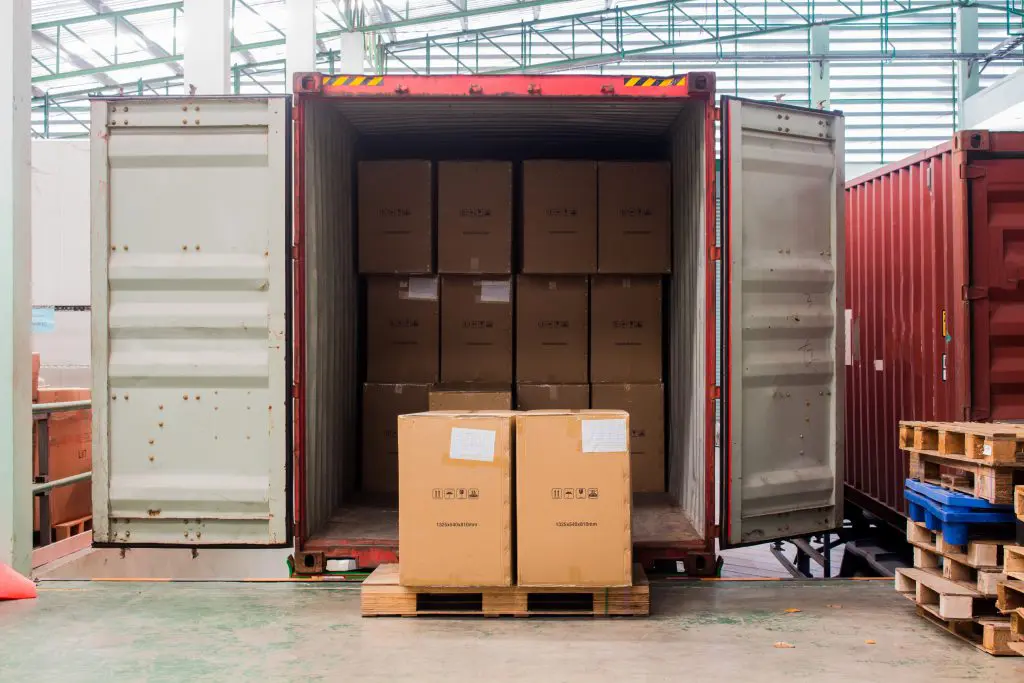 Lumper service - unloading a shipping container